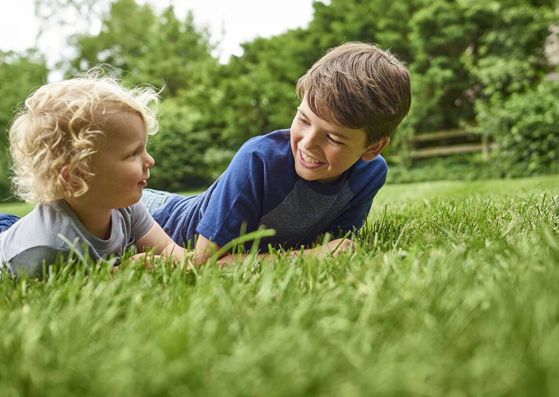 Kids laughing in the yard